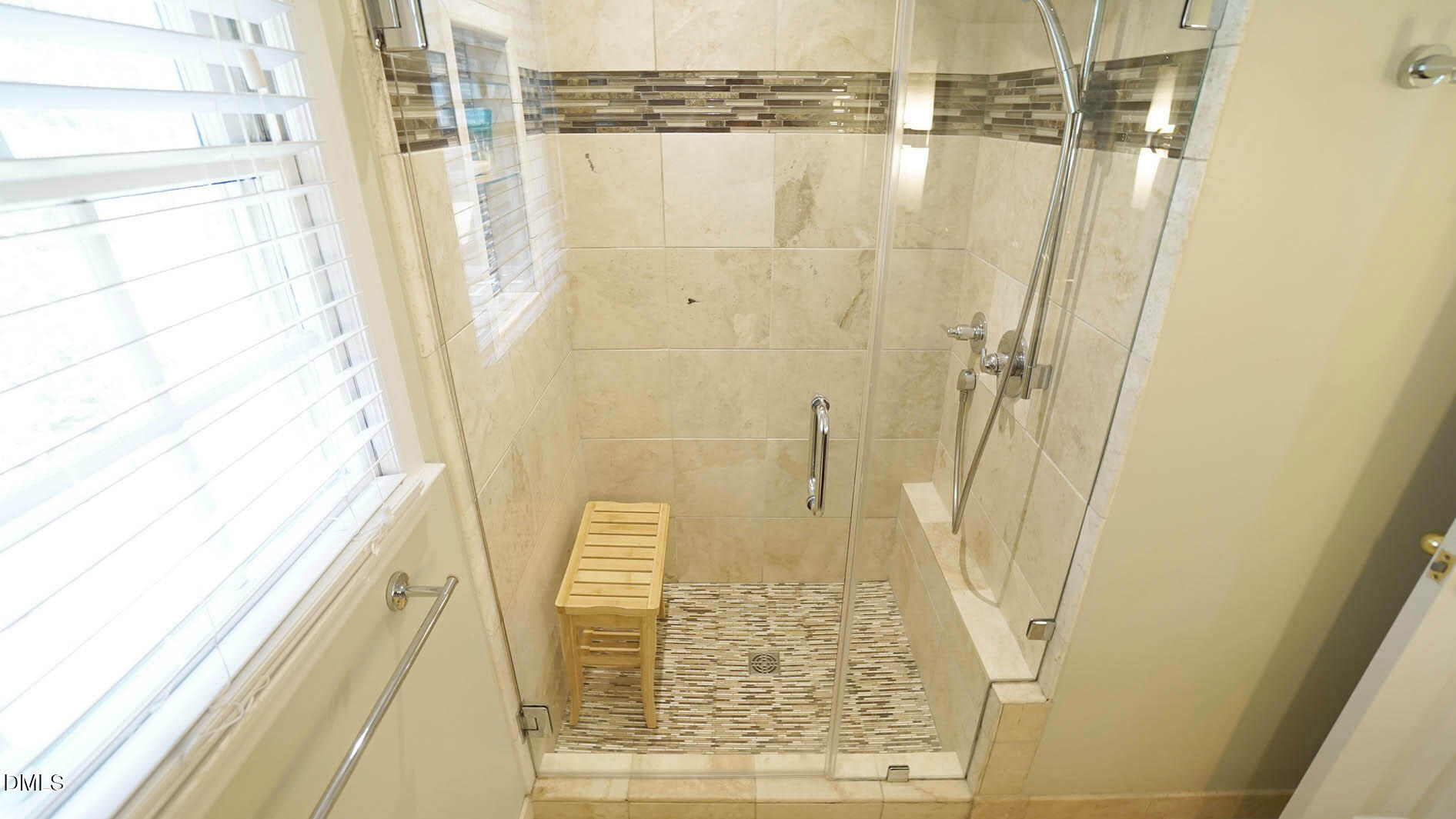 8613 Windjammer Drive Raleigh, NC 27615 - Photo 29 of 52 a bathroom with a shower