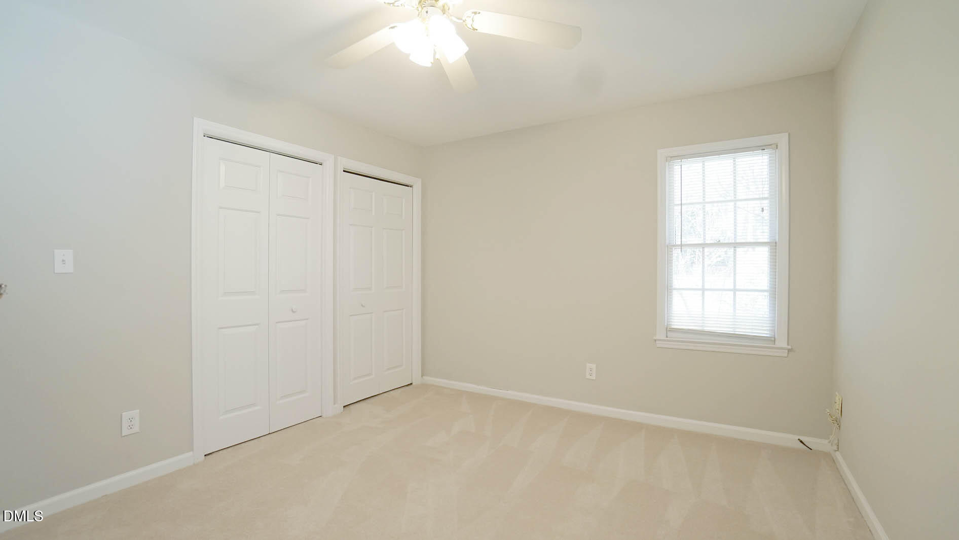 8613 Windjammer Drive Raleigh, NC 27615 - Photo 36 of 52 an empty room with windows