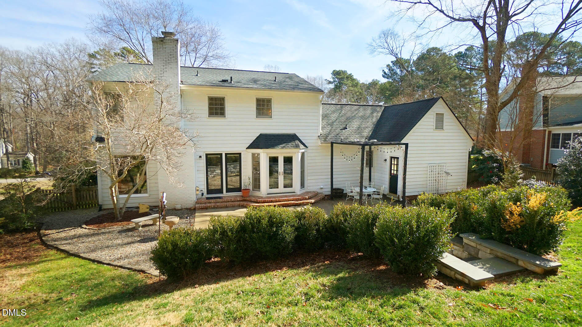 8613 Windjammer Drive Raleigh, NC 27615 - Photo 37 of 52 a front view of a house with a yard
