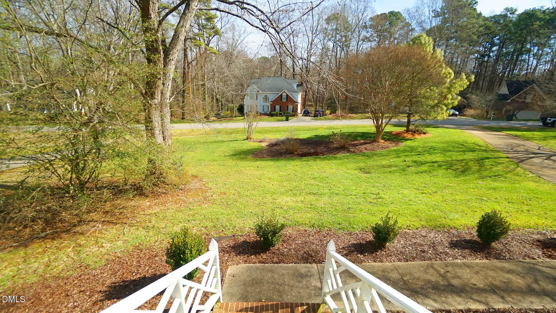 8613 Windjammer Drive Raleigh, NC 27615 - Photo 3 of 52 a view of a yard with an outdoor space
