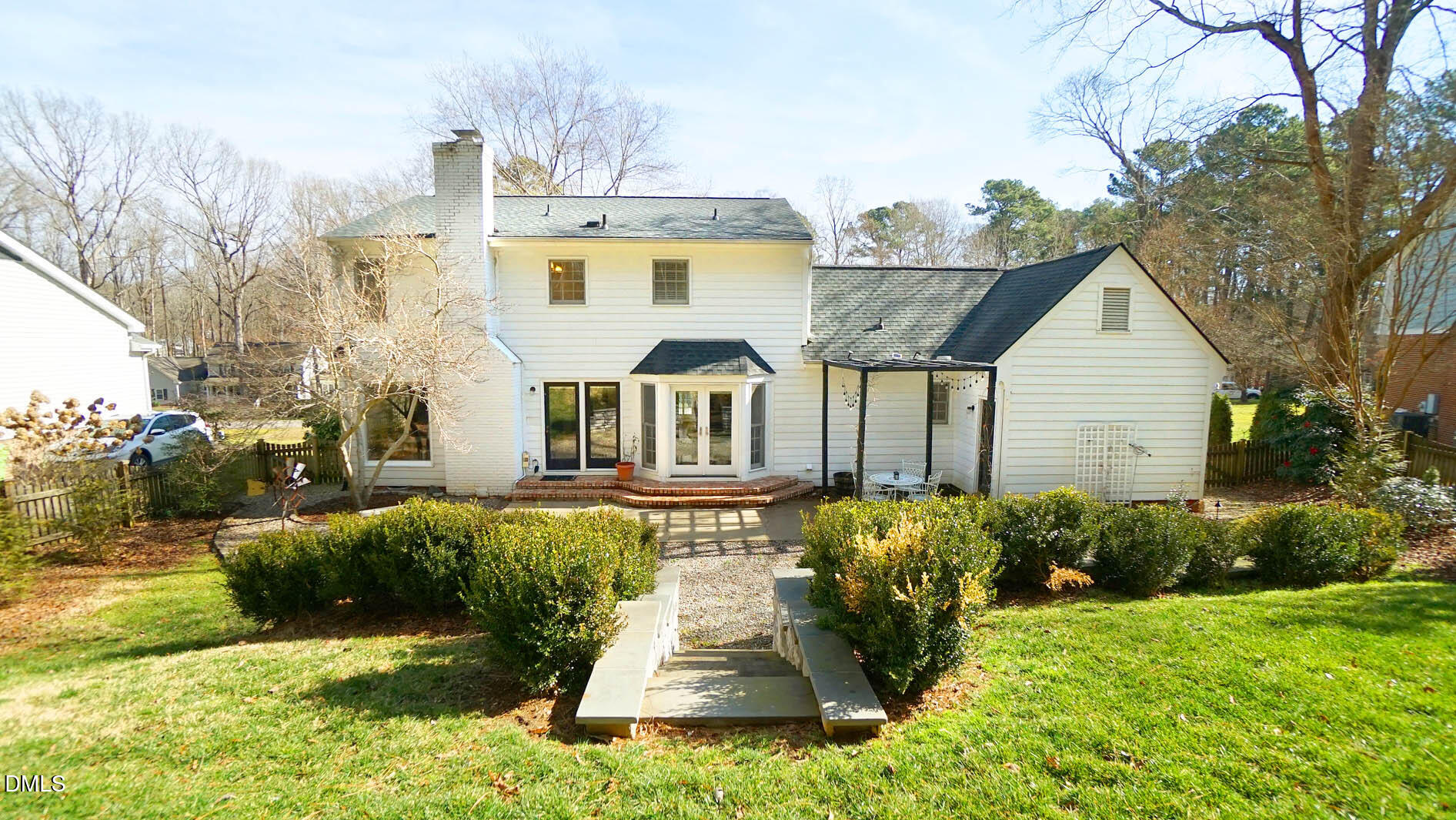 8613 Windjammer Drive Raleigh, NC 27615 - Photo 5 of 52 a front view of house with yard and green space
