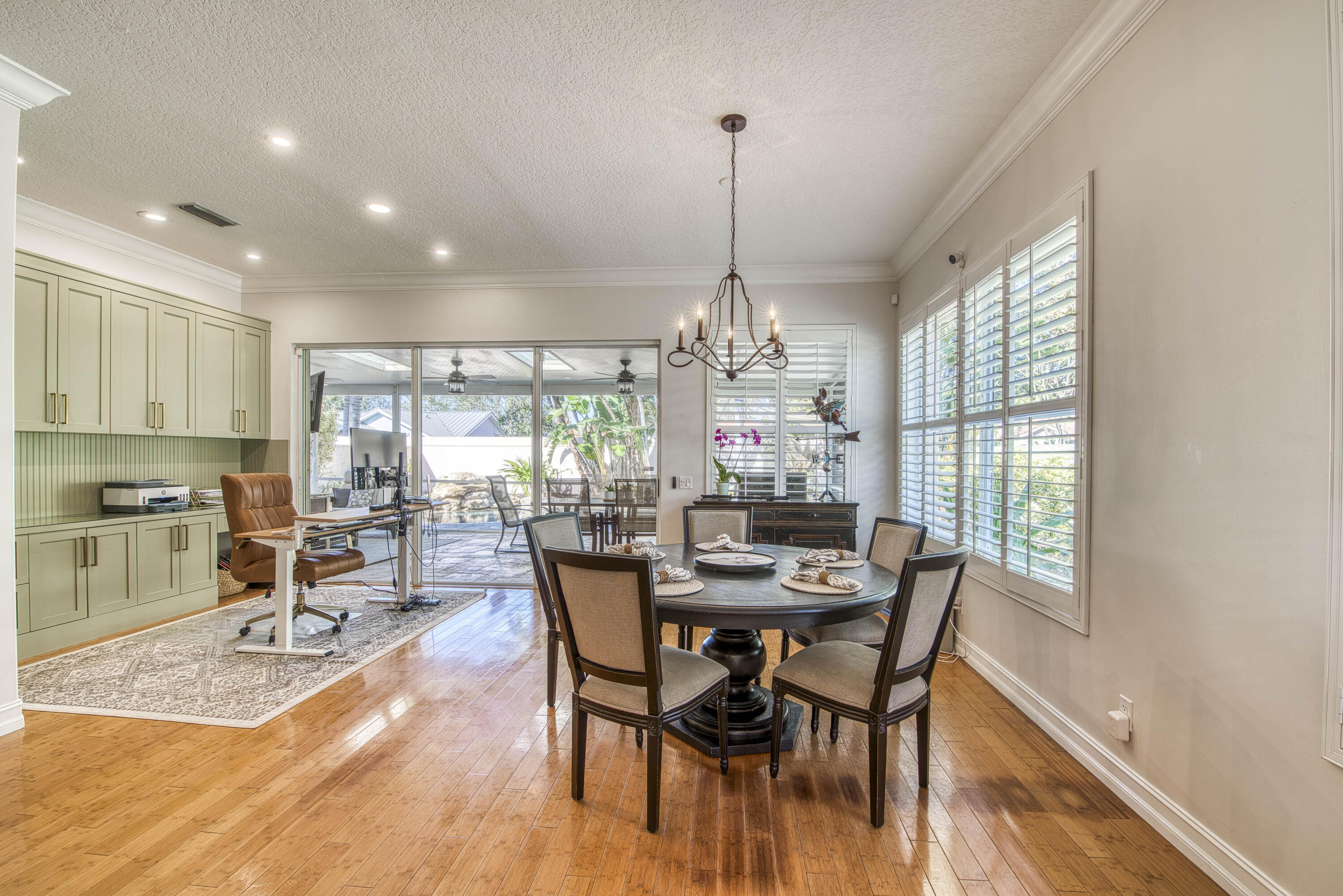 118 East Hampton Way Jupiter, FL 33458 - Photo 15 of 42 a view of a dining room with furniture window and outside view