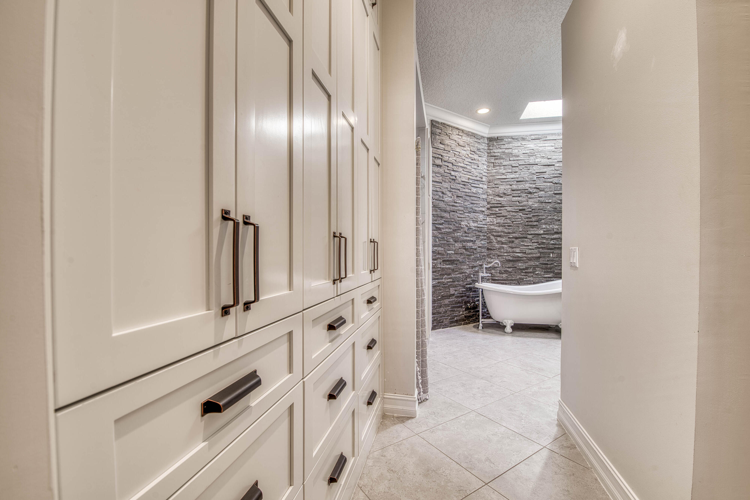 118 East Hampton Way Jupiter, FL 33458 - Photo 23 of 42 a view of water heater room with a washer and dryer