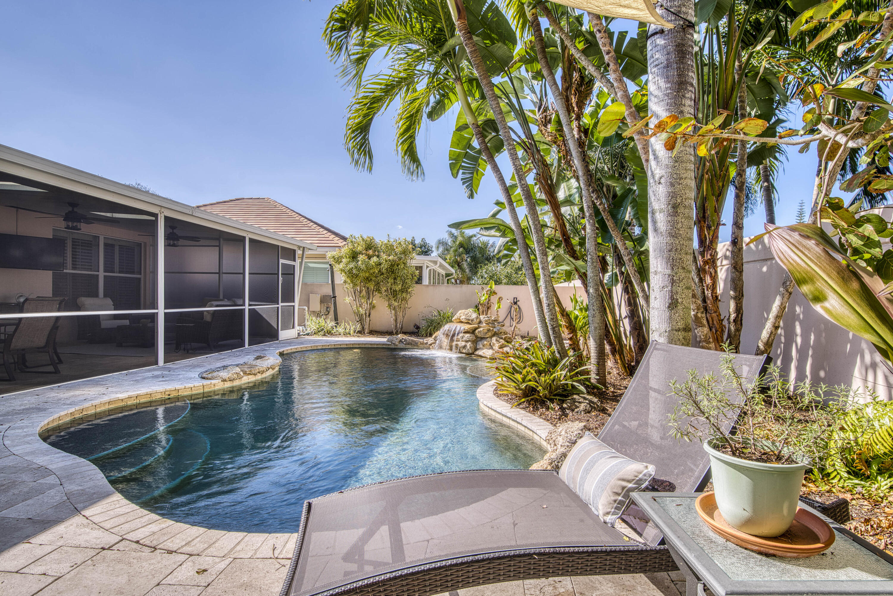118 East Hampton Way Jupiter, FL 33458 - Photo 37 of 42 a view of a swimming pool with potted plants