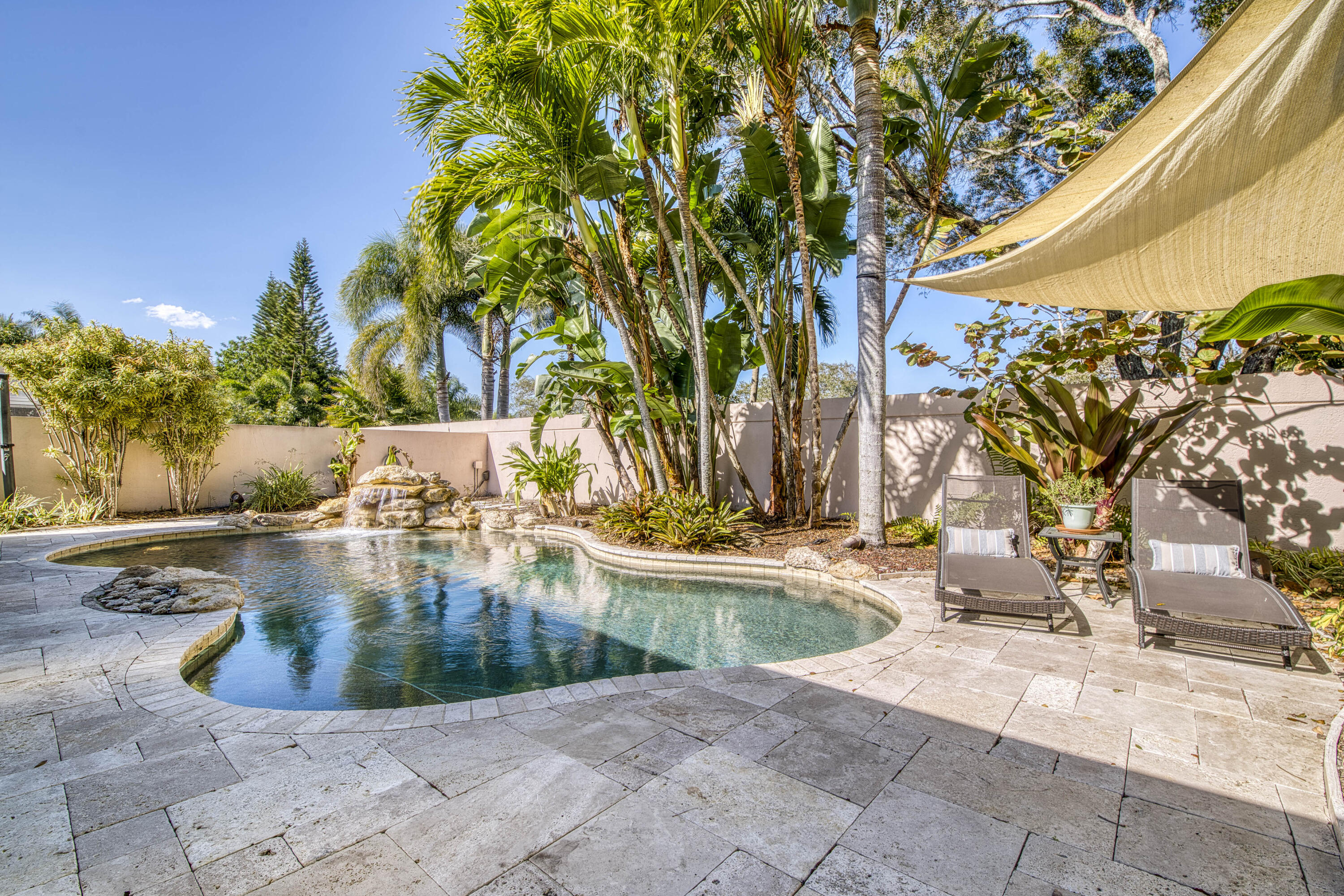118 East Hampton Way Jupiter, FL 33458 - Photo 38 of 42 a view of a swimming pool with a yard