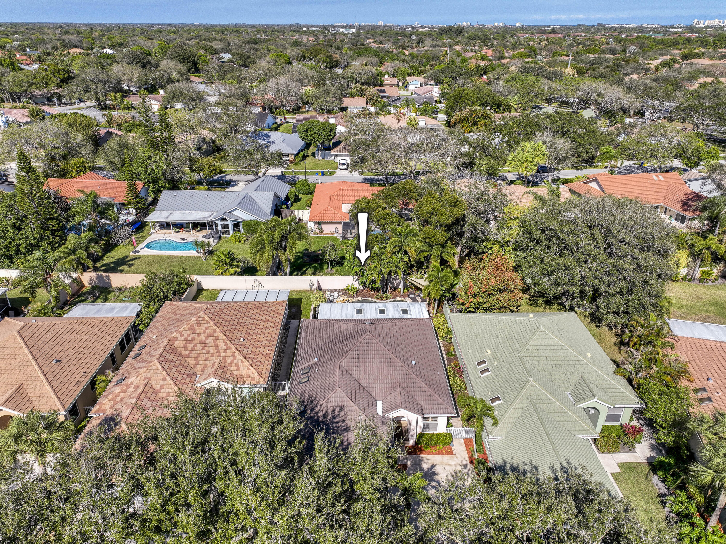 118 East Hampton Way Jupiter, FL 33458 - Photo 39 of 42 an aerial view of residential houses with outdoor space and trees
