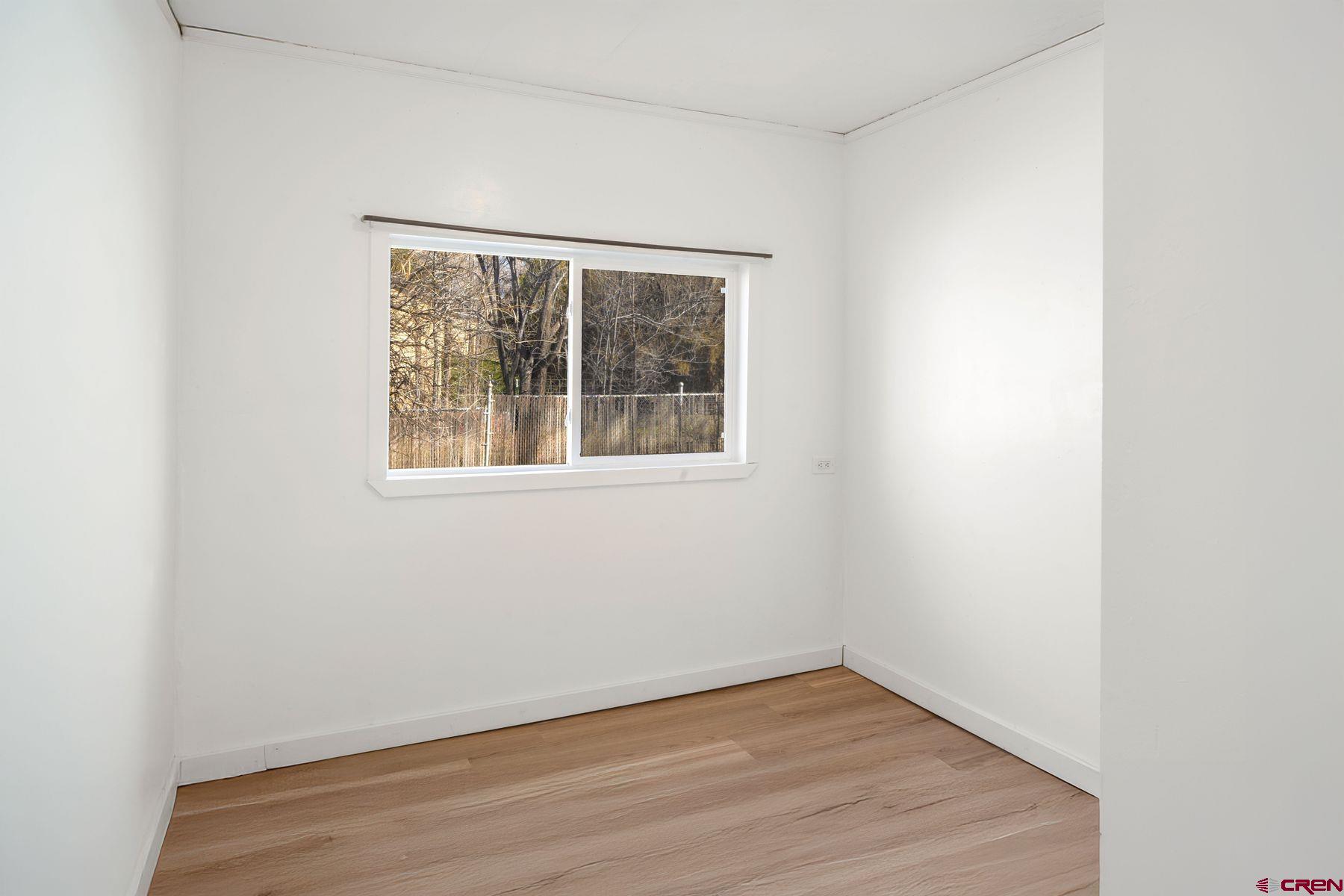 690 Grape Street Nucla, CO 81424 - Photo 17 of 24 an empty room with a window