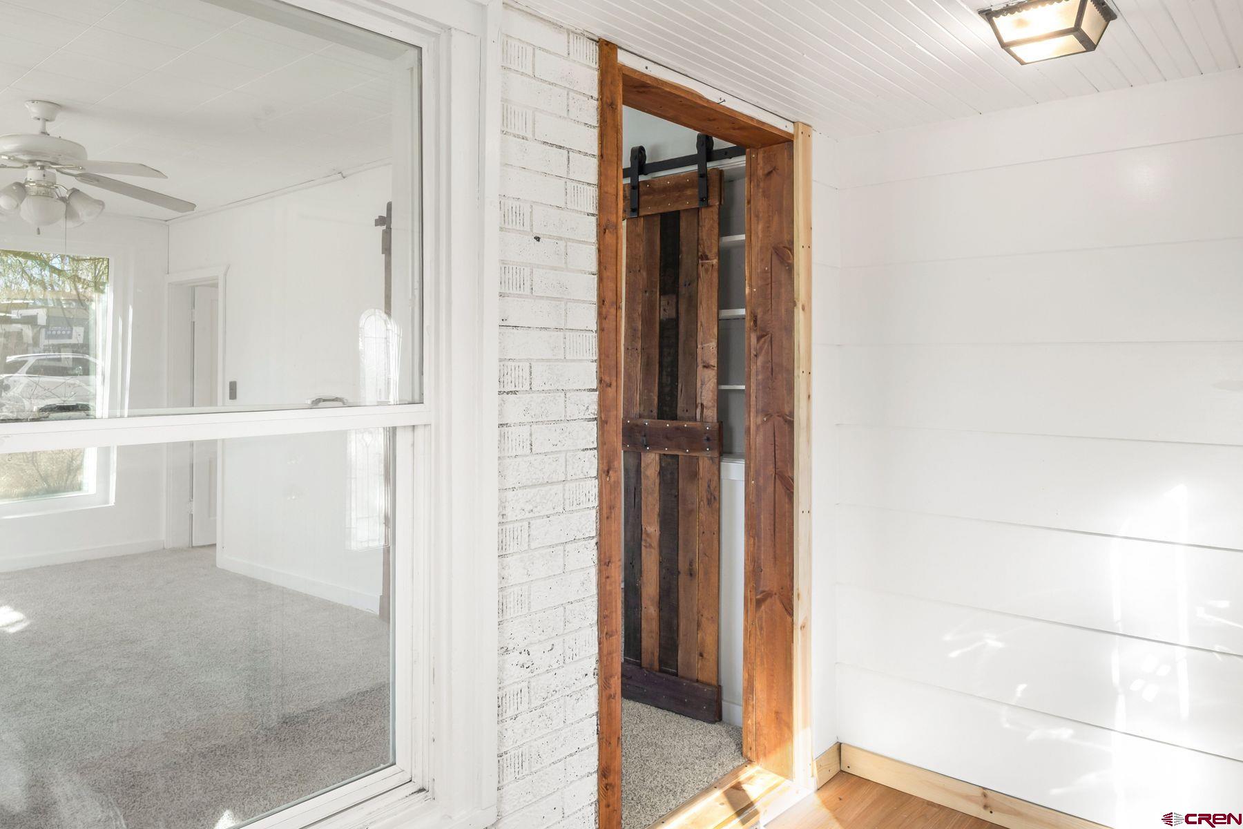 690 Grape Street Nucla, CO 81424 - Photo 20 of 24 view of a bathroom with a glass door and shower