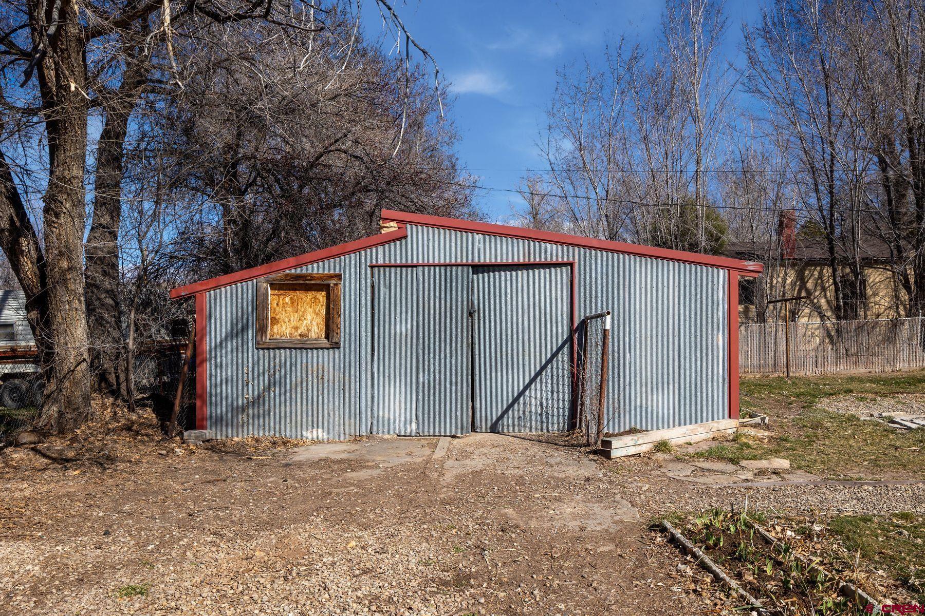 690 Grape Street Nucla, CO 81424 - Photo 21 of 24 a view of a backyard of the house