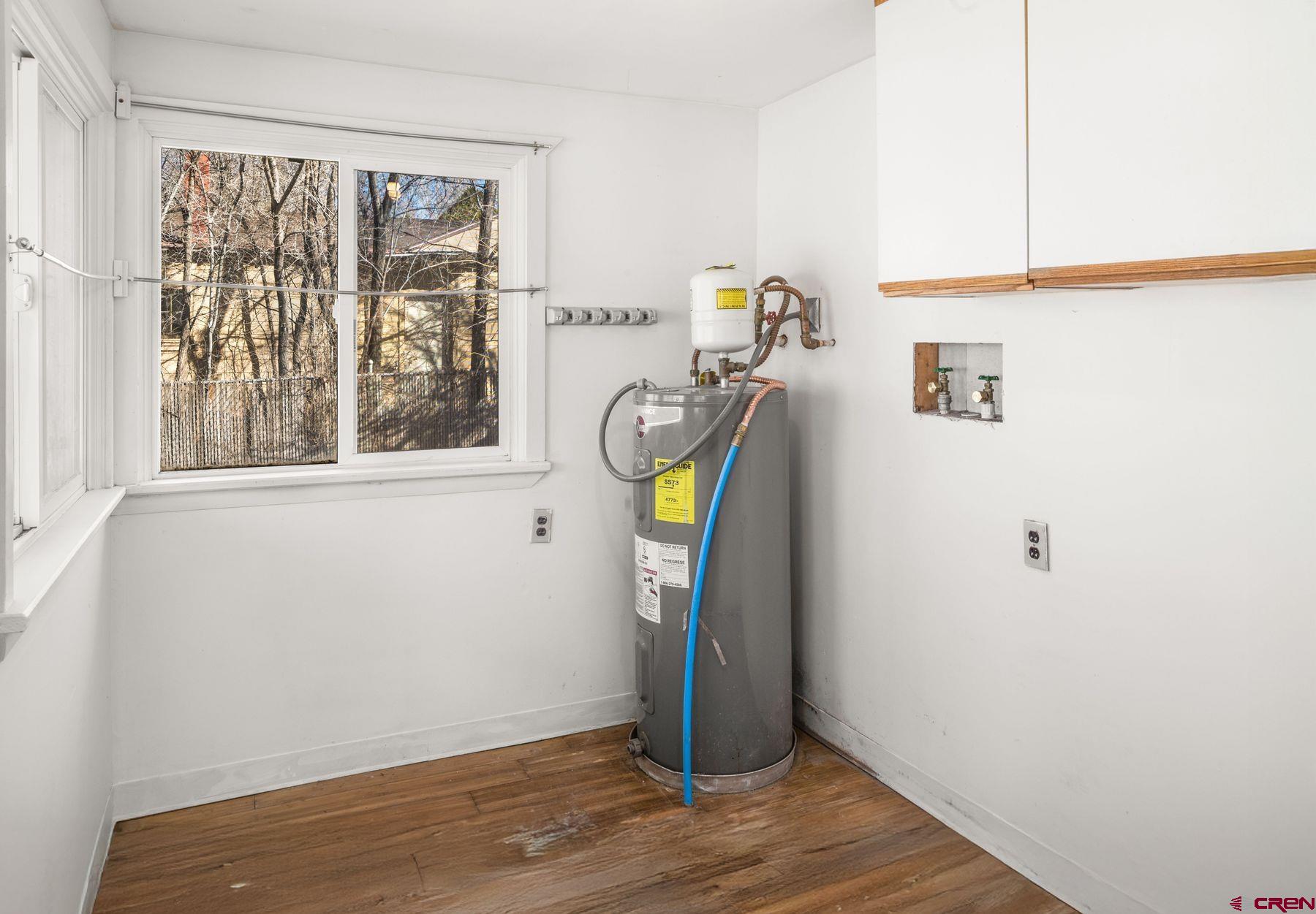 690 Grape Street Nucla, CO 81424 - Photo 7 of 24 a view of a storage & utility room with a window