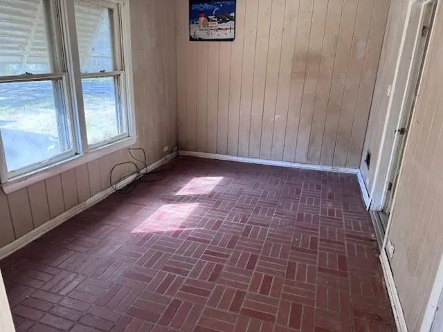 a view of an empty room and window