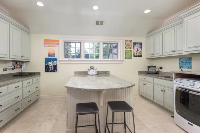 a hallway with dining room and wooden floor
