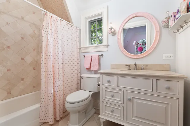 a view of a chairs and table in a room