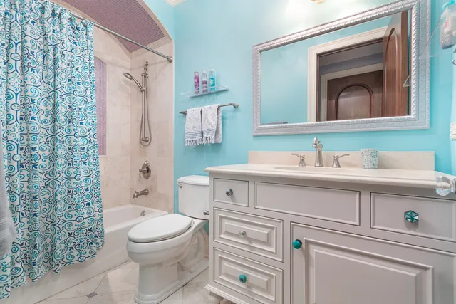 walk in closet with wooden floor