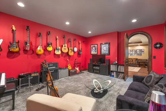 an aerial view of a house with yard swimming pool and outdoor seating