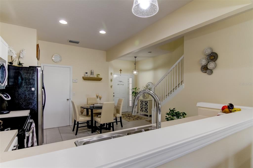 26642 Castleview Way Wesley Chapel, FL 33544 - Photo 15 of 50 a room with gym equipment and a view of living room