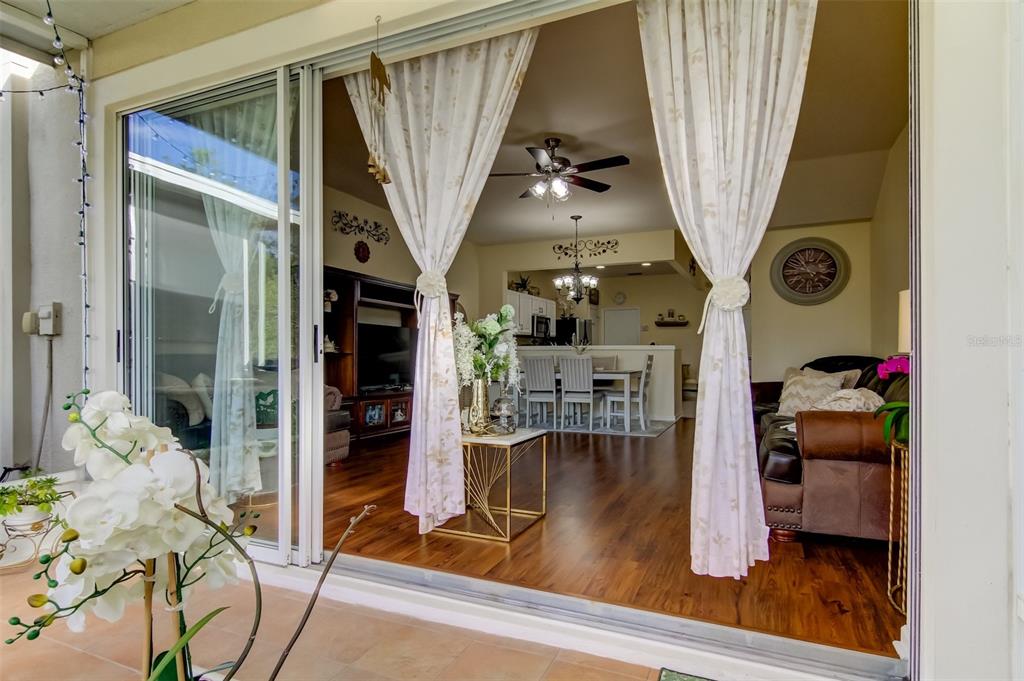 26642 Castleview Way Wesley Chapel, FL 33544 - Photo 19 of 50 a view of entryway and hall with wooden floor