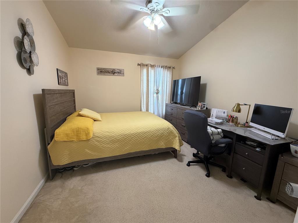 26642 Castleview Way Wesley Chapel, FL 33544 - Photo 37 of 50 a bedroom with a bed and furniture