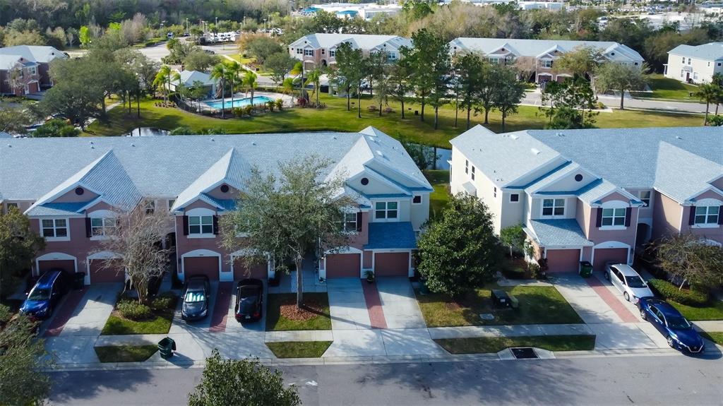 26642 Castleview Way Wesley Chapel, FL 33544 - Photo 40 of 50 an aerial view of house with yard swimming pool and outdoor seating