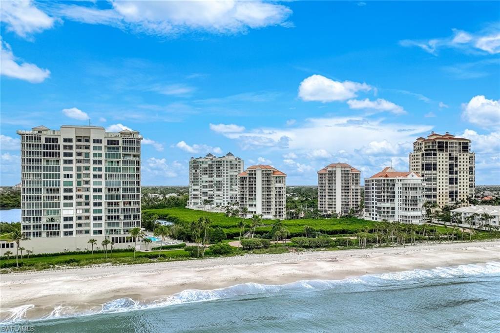 50 Seagate Drive, Unit 703 Naples, FL 34103 - Photo 32 of 34 a view of a city with tall buildings
