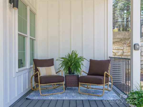 a blue chair sitting in front of a house