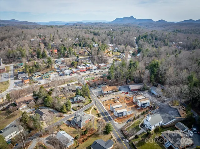 an aerial view of residential house with parking space
