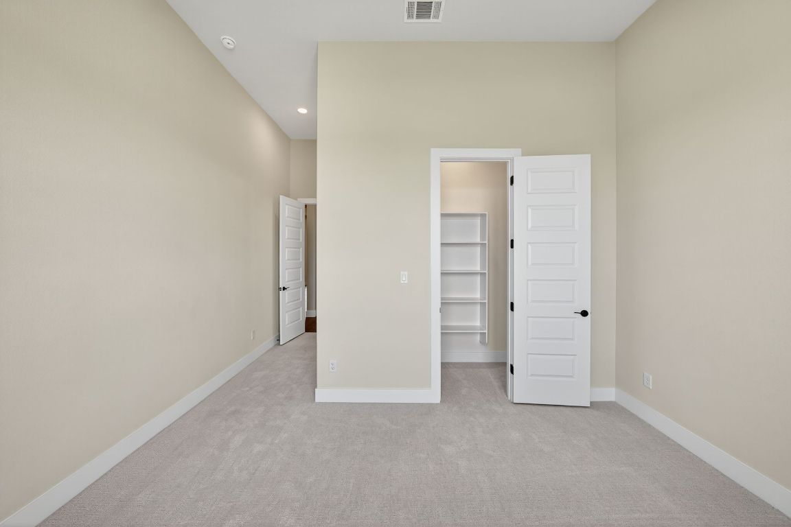 205 Three Rivers Road Georgetown, TX 78633 - Photo 23 of 32 an empty room with closet