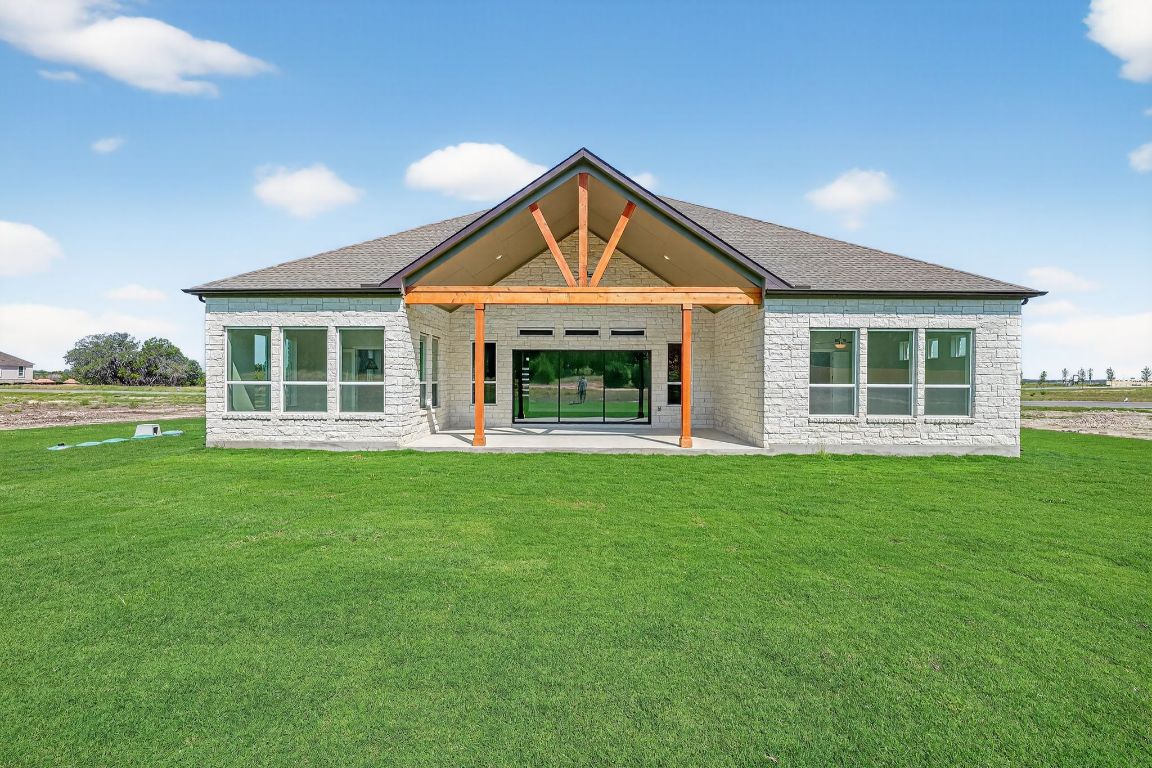 205 Three Rivers Road Georgetown, TX 78633 - Photo 28 of 32 a view of front of house with a yard