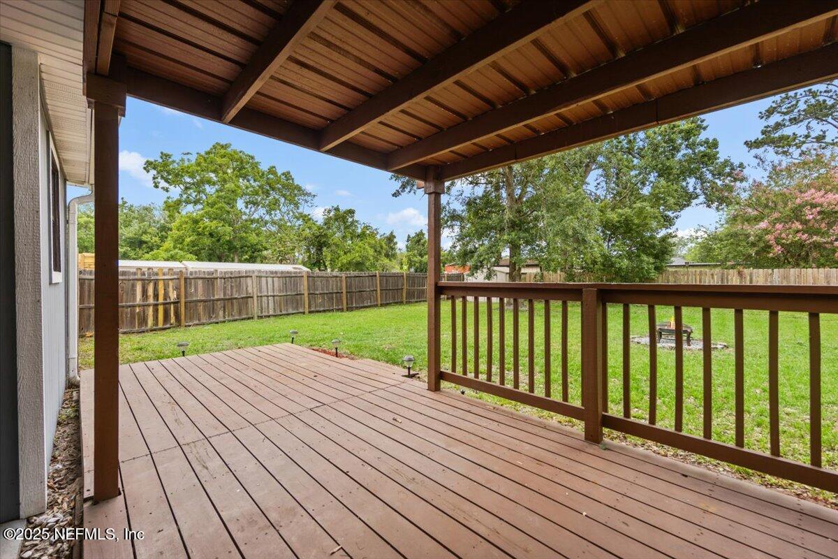 9379 Orme Road Jacksonville, FL 32220 - Photo 17 of 19 a view of porch with wooden floor