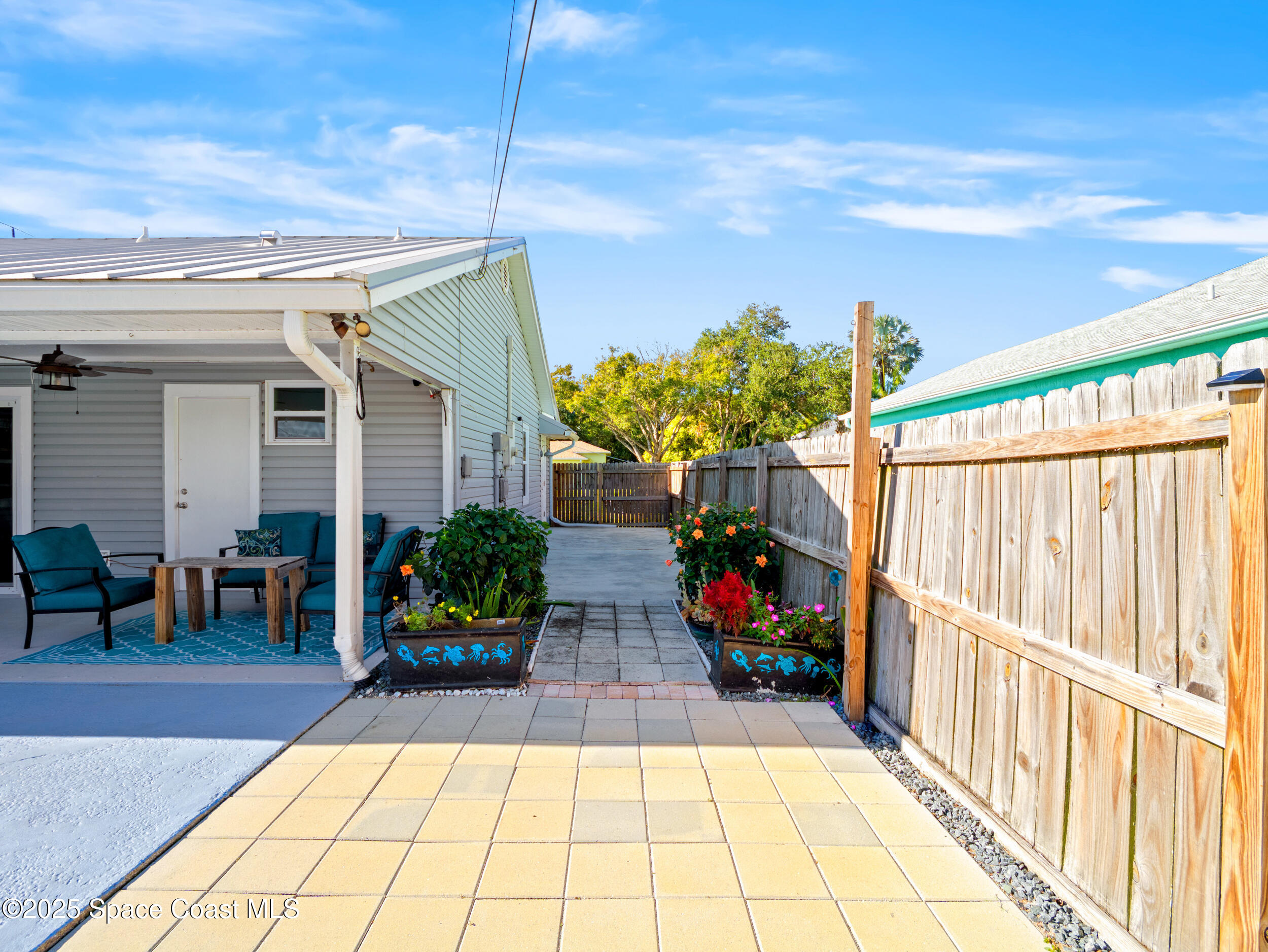 402 Watercrest Street Sebastian, FL 32958 - Photo 24 of 40 a view of a porch with furniture