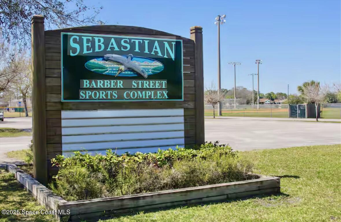 402 Watercrest Street Sebastian, FL 32958 - Photo 36 of 40 a sign on the side of a building