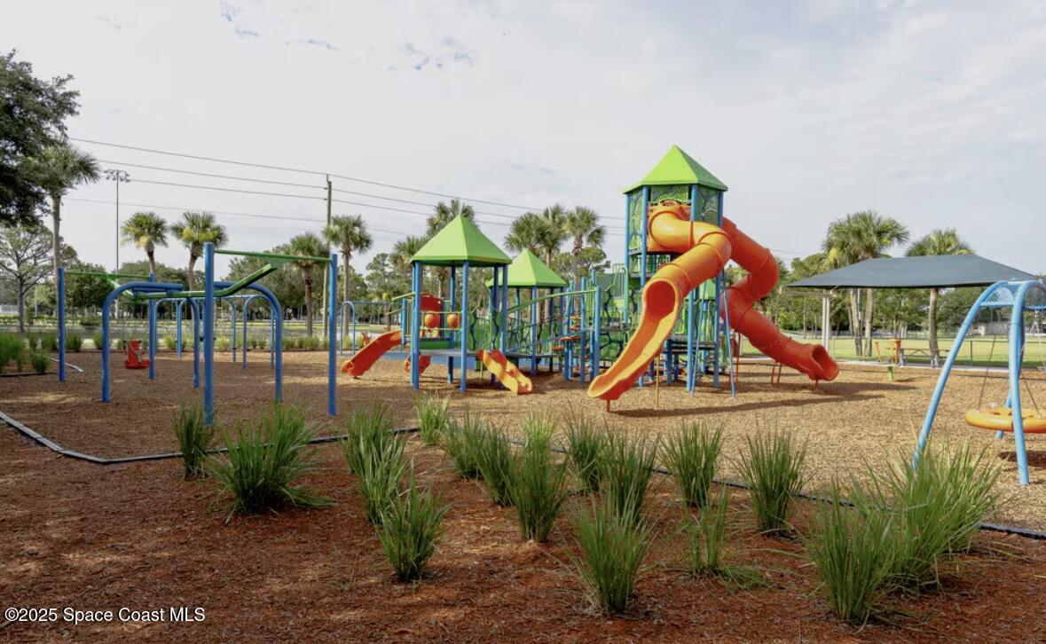 402 Watercrest Street Sebastian, FL 32958 - Photo 37 of 40 a view of outdoor space with garden
