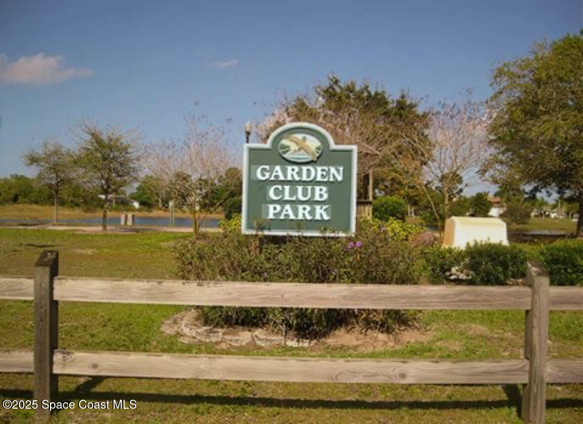 402 Watercrest Street Sebastian, FL 32958 - Photo 39 of 40 a view of swimming pool with a yard and large tree