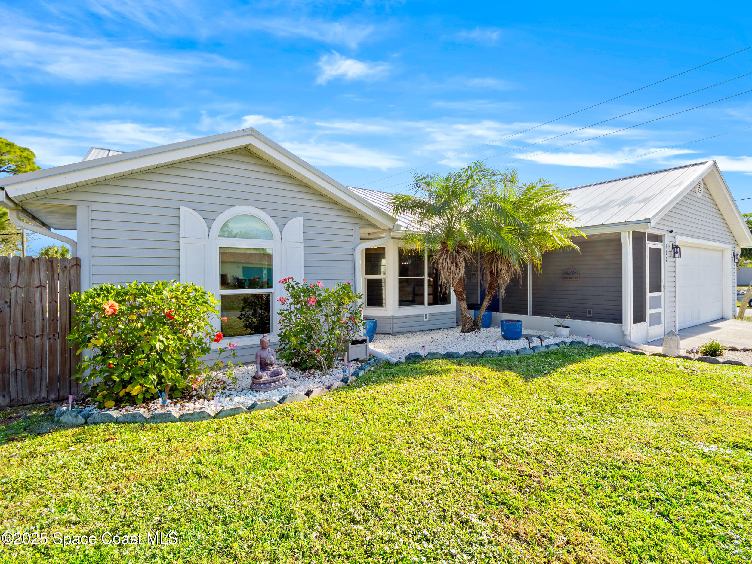 402 Watercrest Street Sebastian, FL 32958 - Photo 9 of 40 a view of a house with swimming pool and sitting area