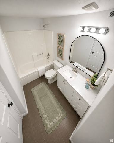30 West 7500th Street South, Unit 18 Midvale, UT 84047 - Photo 10 of 14 Bathroom featuring a white vanity with a quartz-finish countertop, single basin sink, and chrome fixtures