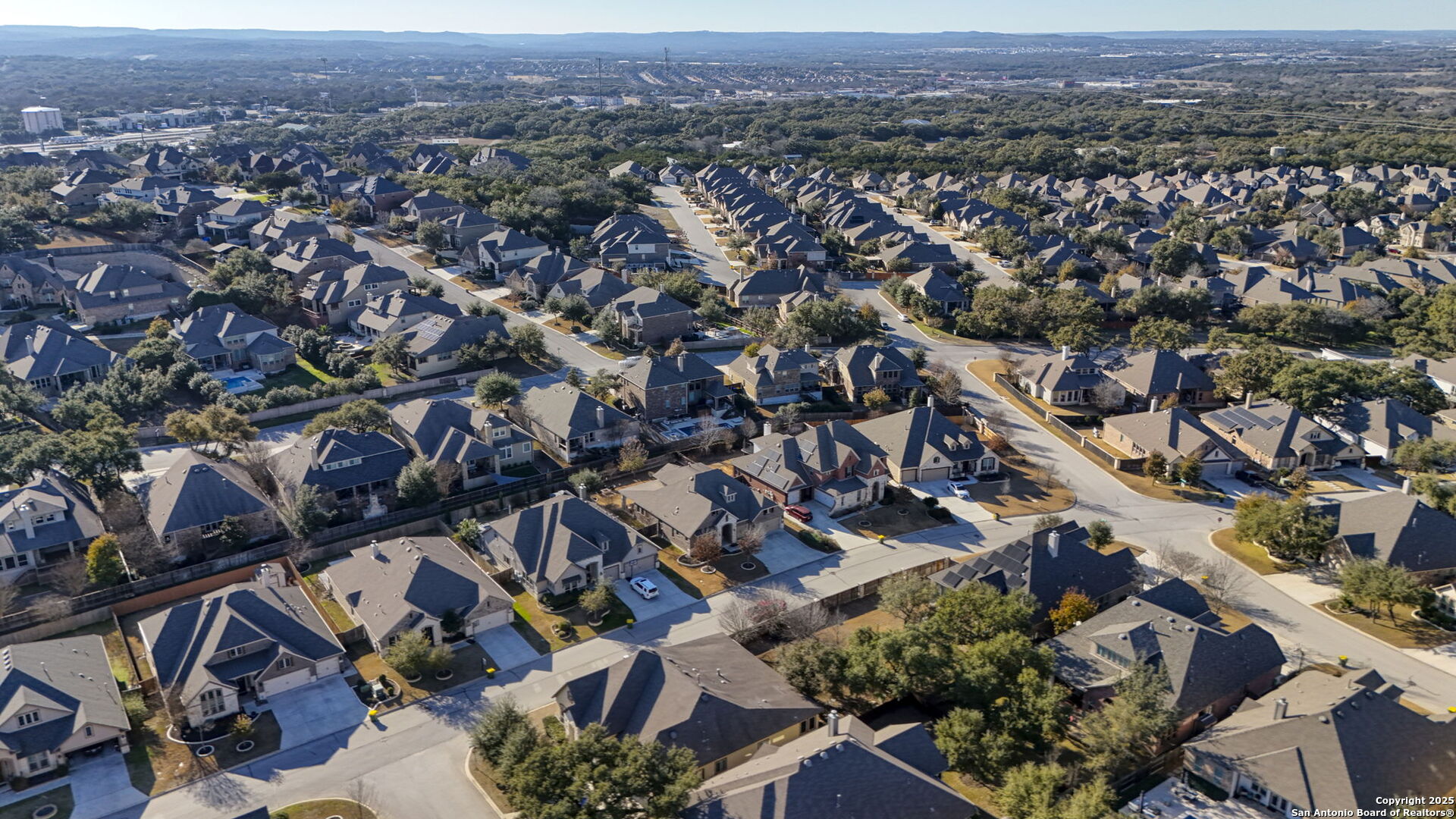 28827 Pfeiffers Gate Fair Oaks Ranch, TX 78015 - Photo 35 of 36 an aerial view of a city with lots of residential buildings