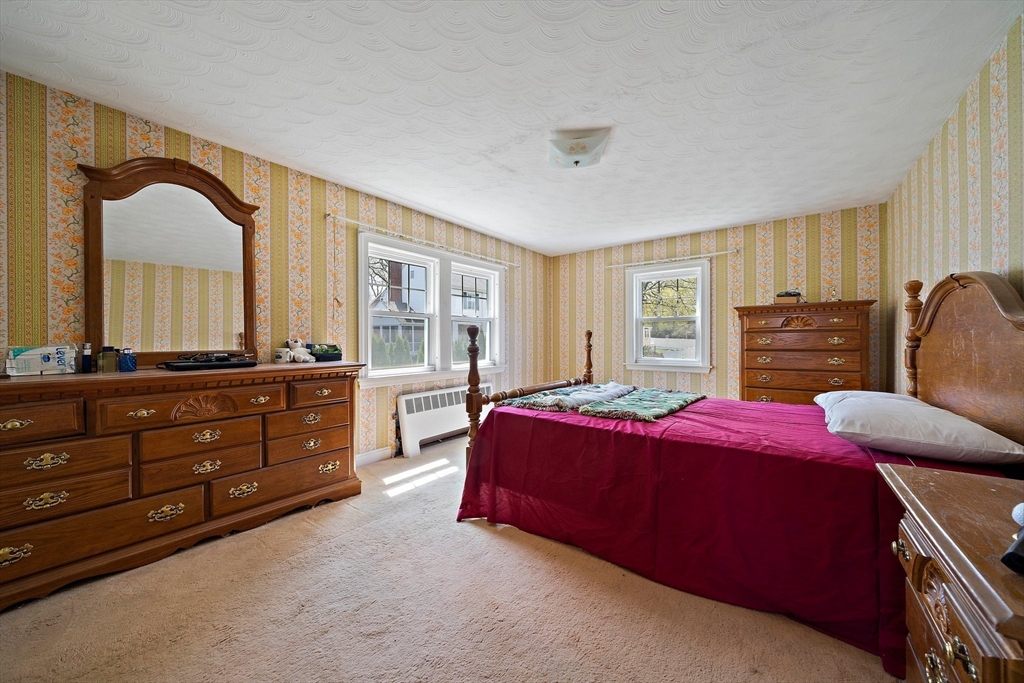 11 Latin Road Boston, MA 02132 - Photo 13 of 30 a bedroom with a bed and a dresser