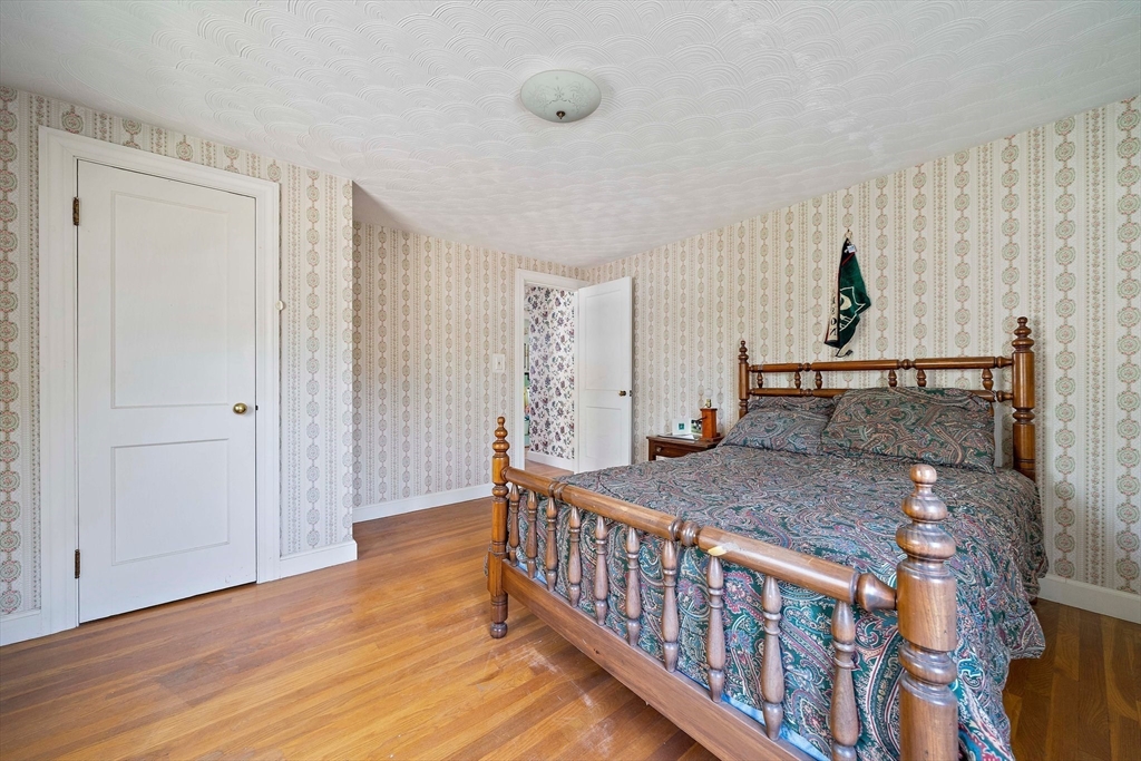 11 Latin Road Boston, MA 02132 - Photo 16 of 30 a bedroom with furniture and window