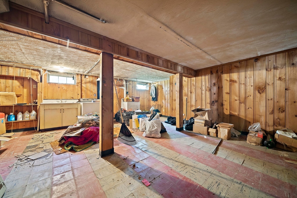 11 Latin Road Boston, MA 02132 - Photo 20 of 30 a living room with furniture and floor to ceiling window