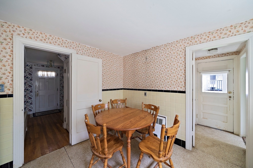 11 Latin Road Boston, MA 02132 - Photo 5 of 30 a view of a dining room with furniture