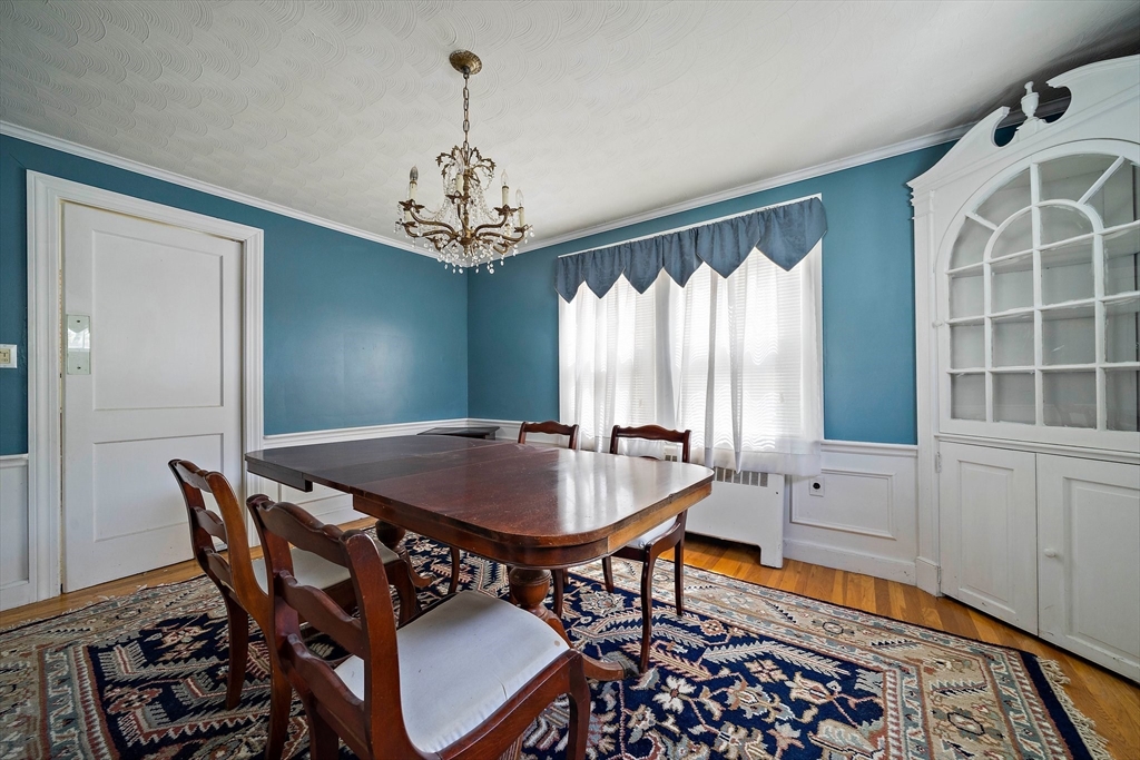 11 Latin Road Boston, MA 02132 - Photo 7 of 30 a dining room with furniture window and wooden floor