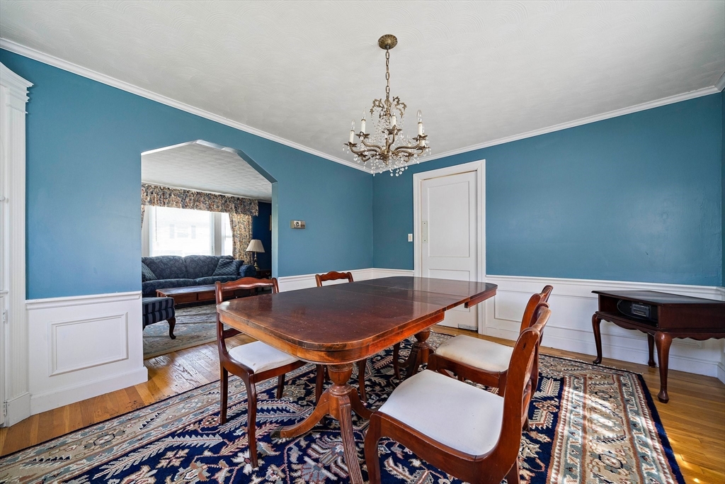 11 Latin Road Boston, MA 02132 - Photo 8 of 30 a view of a dining room with furniture window and wooden floor