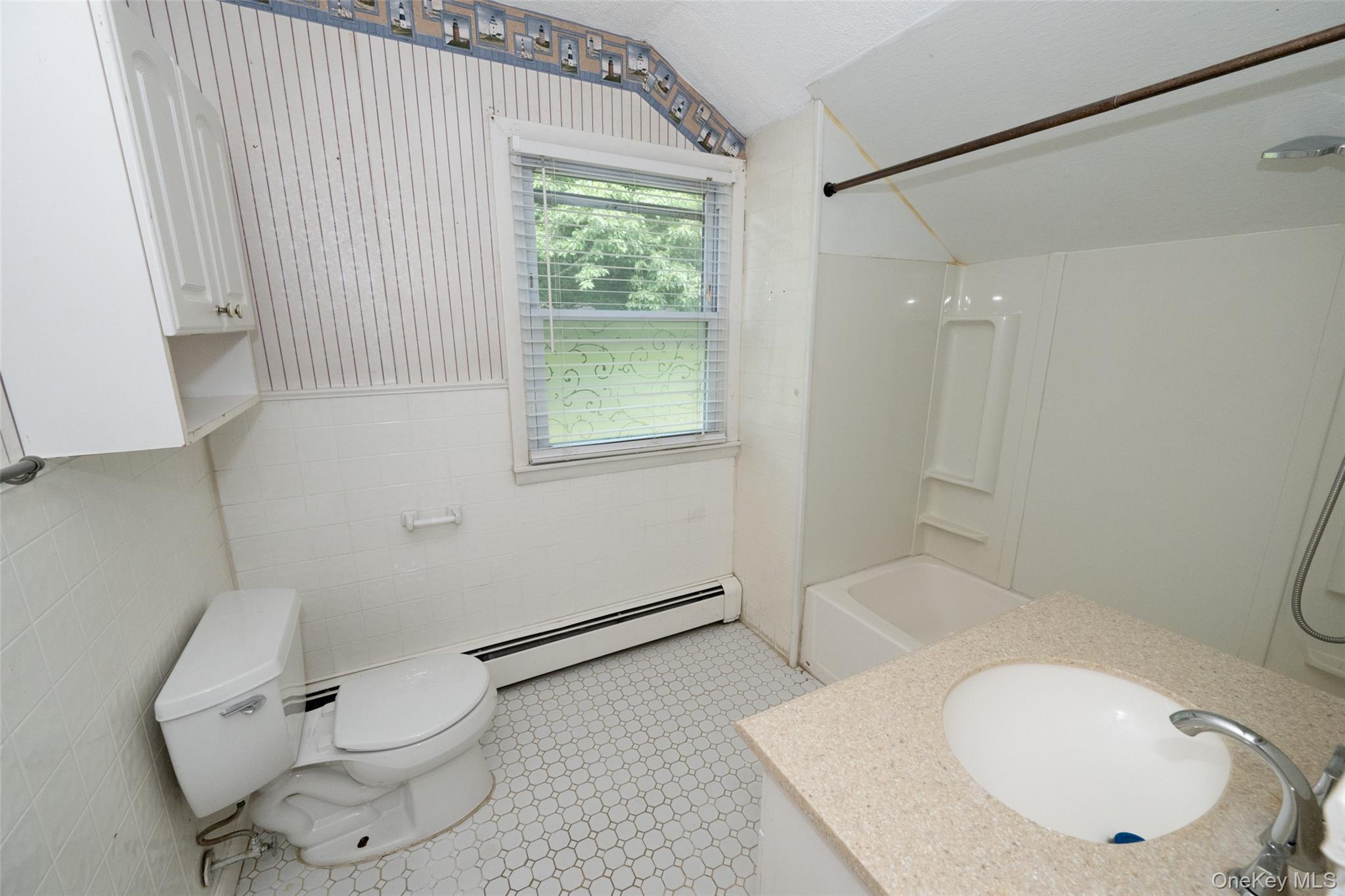 136 Foggintown Road Brewster, NY 10509 - Photo 35 of 50 a bathroom with a toilet a sink and bathtub
