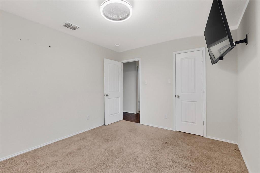 5516 McClelland Street Forney, TX 75126 - Photo 13 of 36 Unfurnished bedroom featuring carpet floors and baseboards