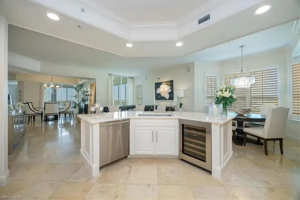 a kitchen with sink and microwave