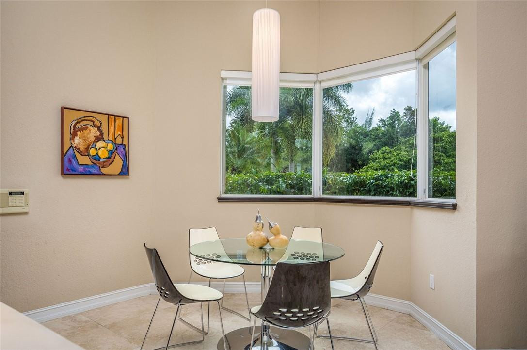 3620 Paddock Road Weston, FL 33331 - Photo 11 of 51 a view of a dining room with furniture a bedroom and a window