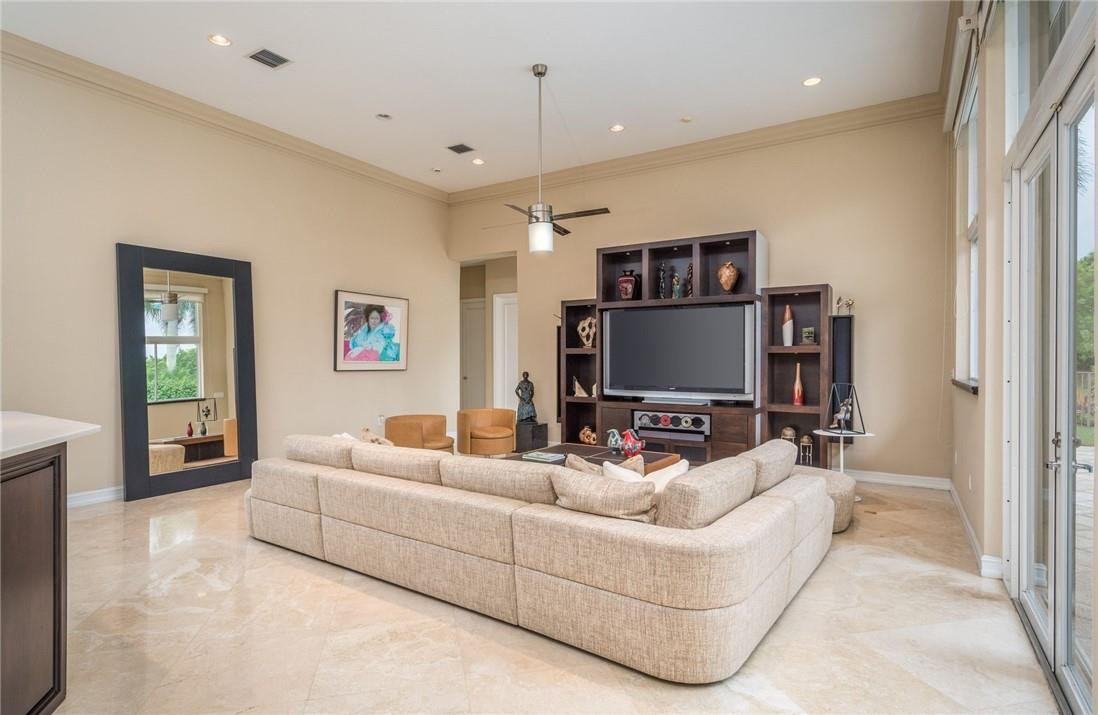 3620 Paddock Road Weston, FL 33331 - Photo 13 of 51 a living room with furniture and a flat screen tv