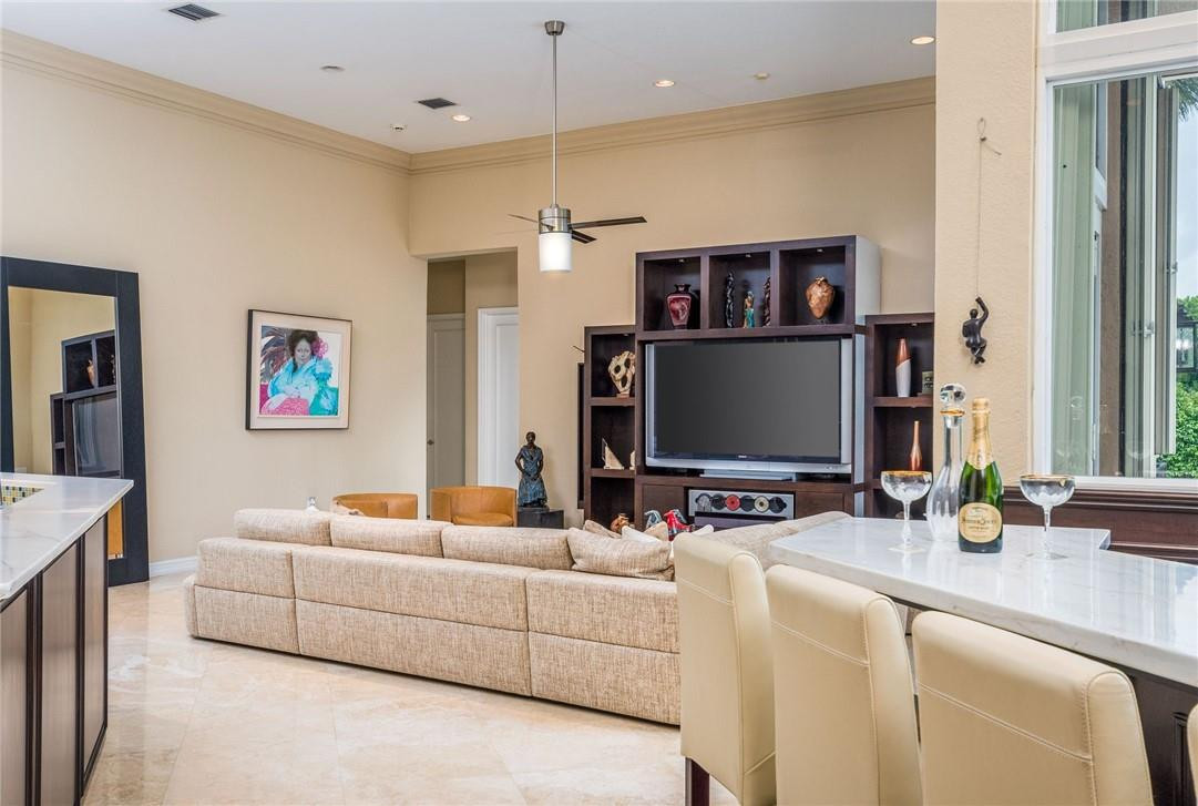 3620 Paddock Road Weston, FL 33331 - Photo 15 of 51 a living room with furniture and a flat screen tv