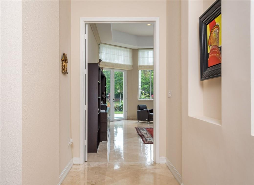 3620 Paddock Road Weston, FL 33331 - Photo 19 of 51 a hallway with kids room bathroom