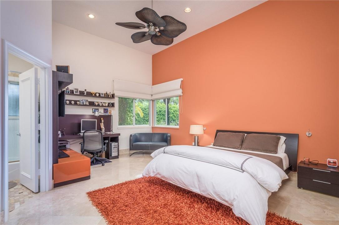 3620 Paddock Road Weston, FL 33331 - Photo 23 of 51 a bedroom with furniture and a large window